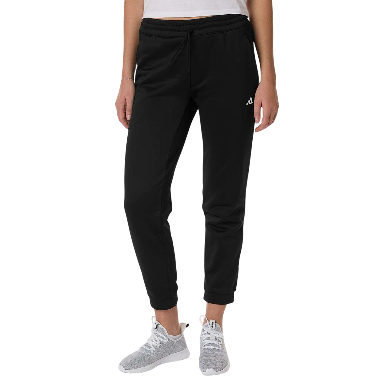 Black adidas Women’s Game & Go Fleece Sweatpants in black recycled polyester fleece with elastic drawcord waistband, zippered side pockets, and heat-seal logo, designed for athletic training and casual comfort.