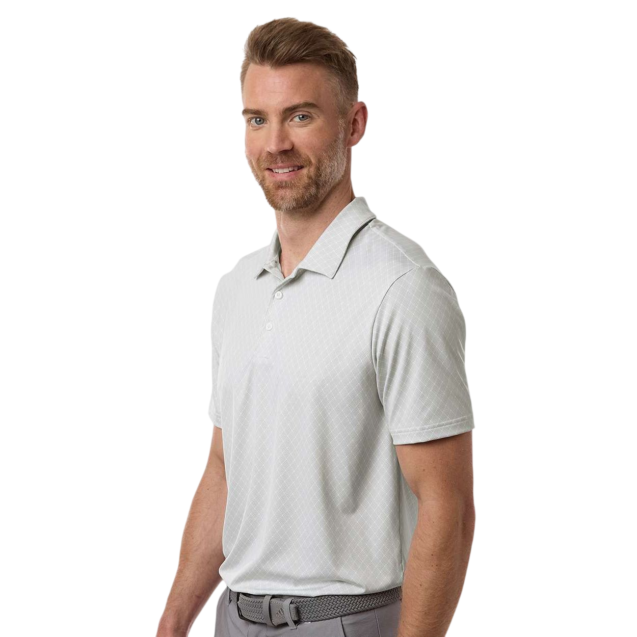 White Adidas Men’s 4-Way Stretch Printed Polo featuring lightweight recycled polyester stretch fabric, self-collar, three-button placket, subtle all-over grid print pattern, and athletic performance fit for golf, corporate apparel, or team wear.