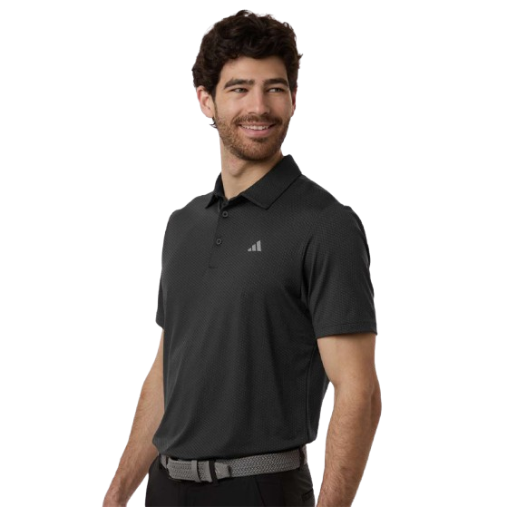 Carbon grey Adidas men’s textured performance polo with black accents, three-button placket, stretch recycled polyester fabric, and athletic regular fit.