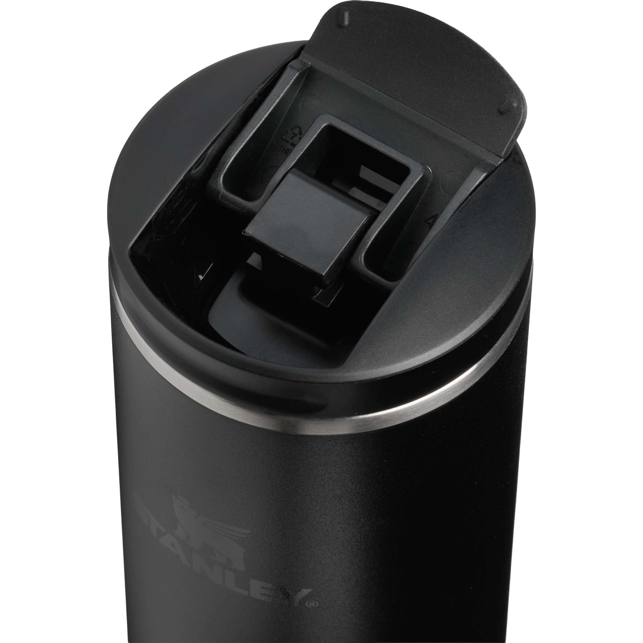Black Stanley® Transit Flip Top Mug 16 oz stainless steel travel mug with flip-top leakproof lid, slim insulated design, and reusable drink container for commuting and hot or cold beverages.