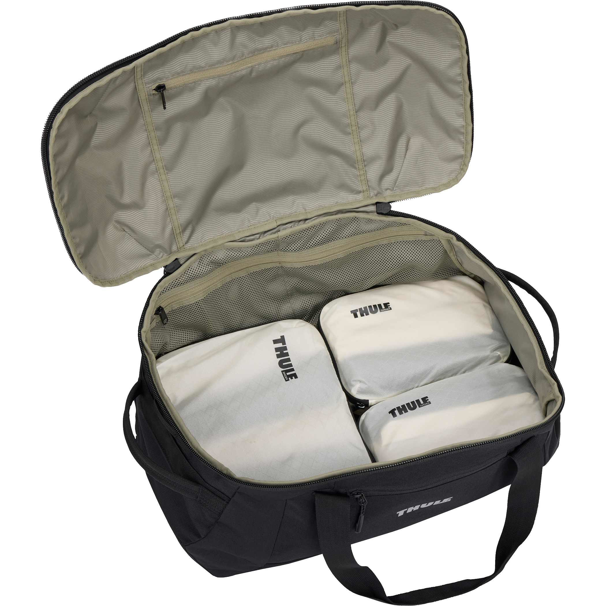 Thule Lumion Duffle in black recycled polyester material placed in a modern travel setting, shown as a spacious duffel bag with structured shape and front zippered pocket designed for organized packing and travel use.