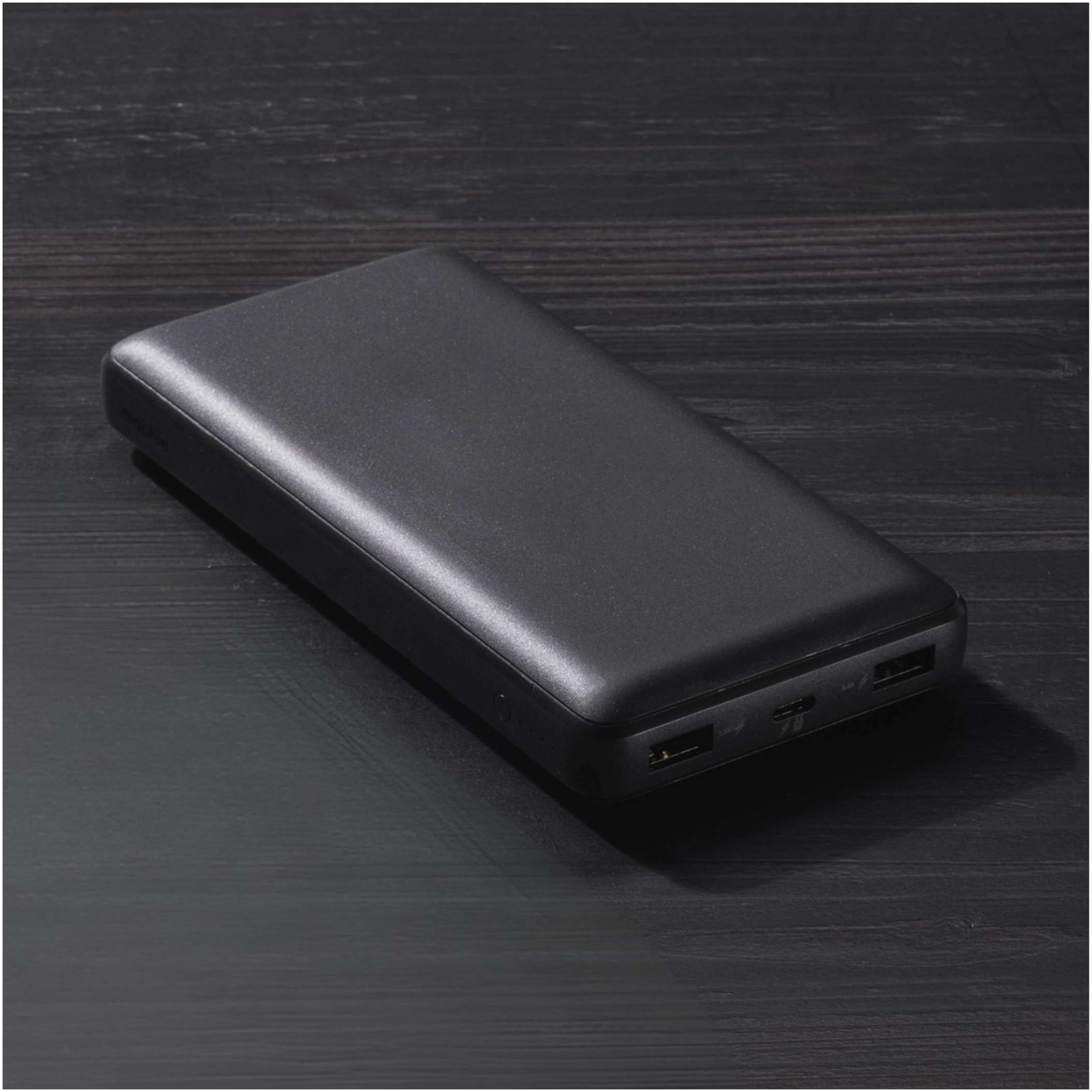 mophie Power Boost Pro XL 20000mAh portable power bank in black with a compact rectangular design, featuring USB-A and USB-C ports and an LED power indicator, designed for charging multiple mobile devices such as smartphones and tablets.