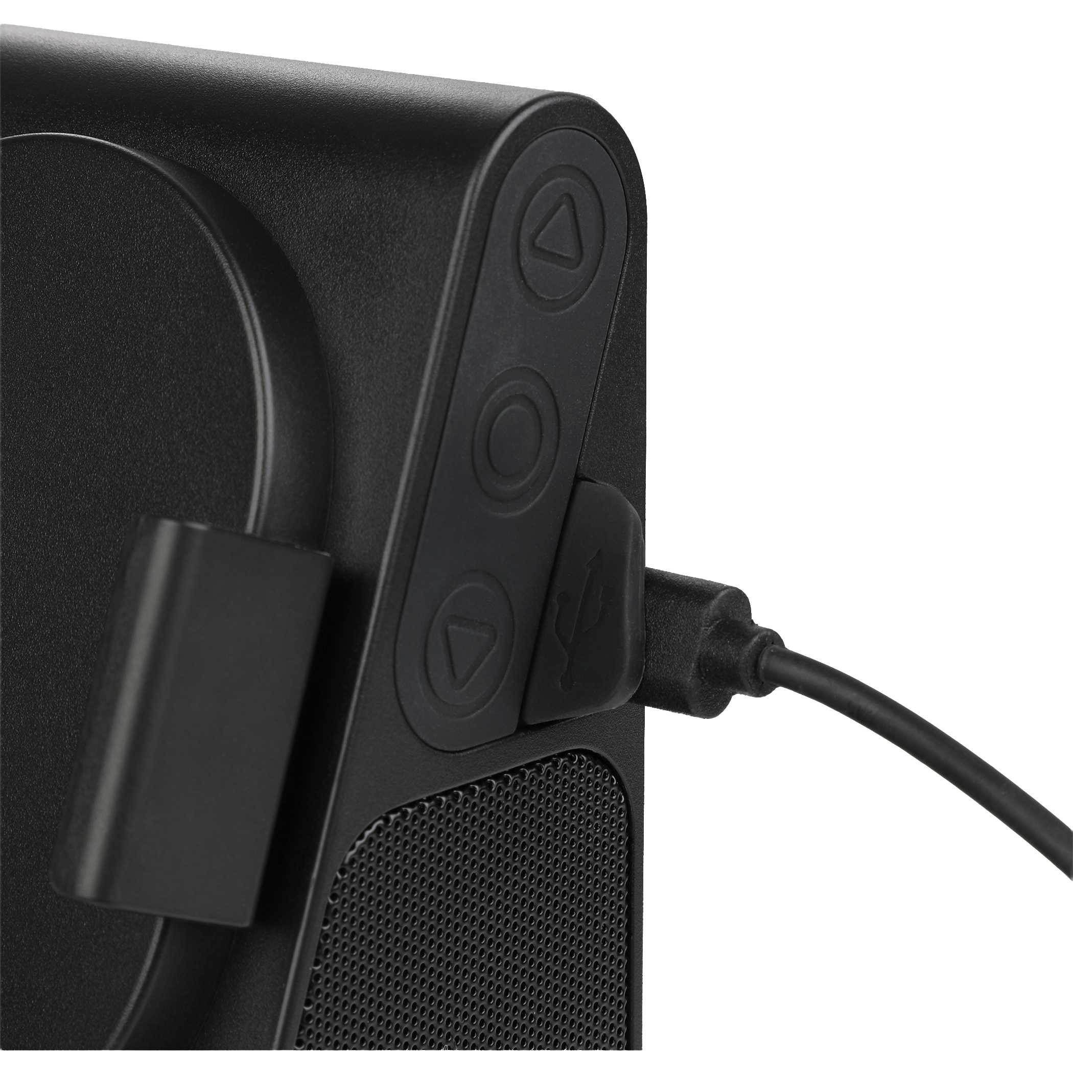 Phone Grip Outdoor Magnetic Bluetooth Speaker in black ABS plastic shown mounted to a metal surface in a fitness or locker-style environment, highlighting the magnetic attachment and integrated phone stand for stable, hands-free use.