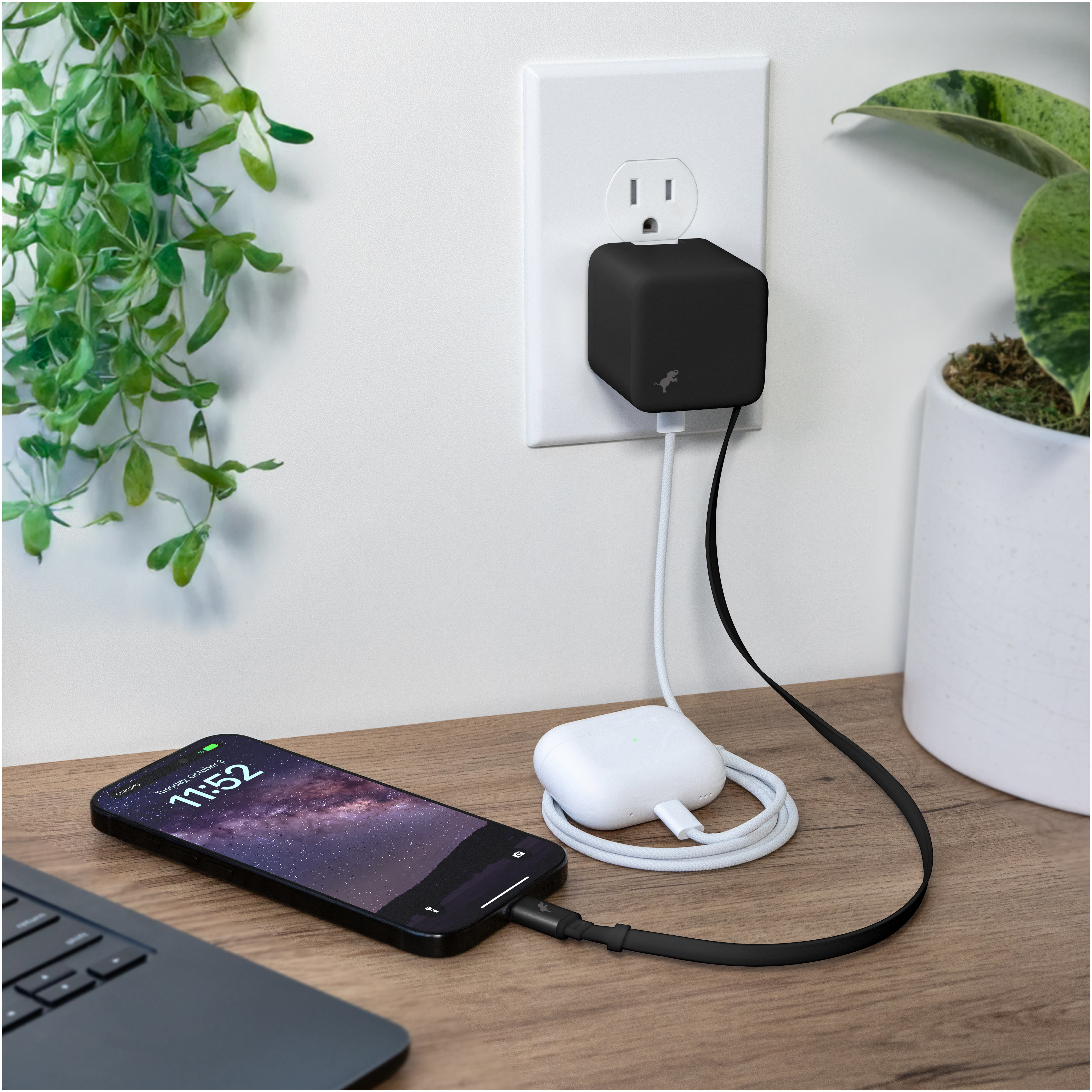 Nimble Wally Stretch 35 Wall Charger with Retractable Cable in black matte finish with compact rectangular body, folding AC prongs, and integrated USB-C cable, designed for fast charging smartphones and USB-C devices in home, office, or travel use.