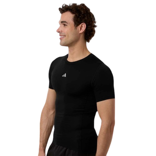 Black performance compression t-shirt made from recycled polyester and elastane with crewneck collar, moisture-management technology, and athletic stretch fit.