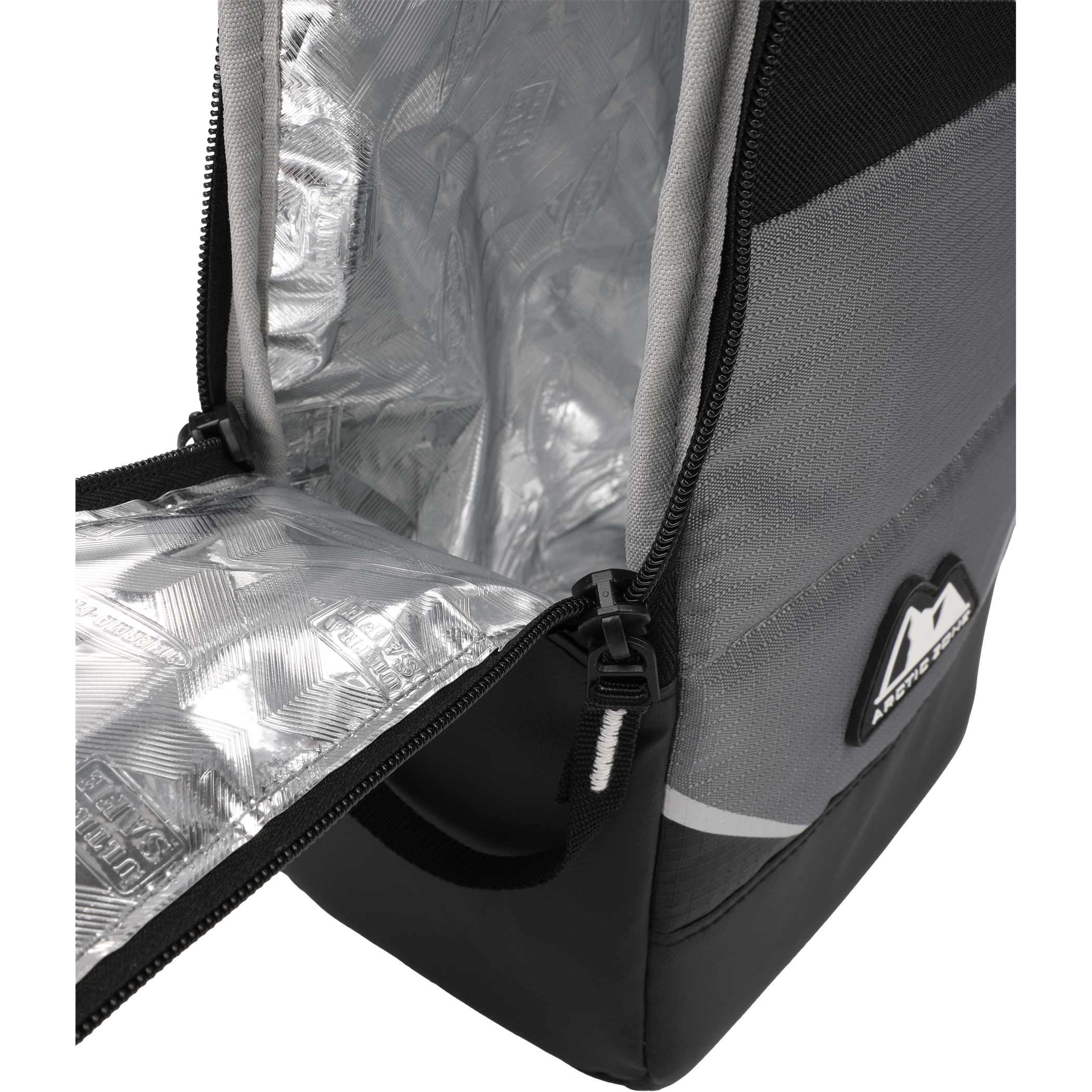 Arctic Zone Rolltop Cinch Cooler in black insulated fabric with roll-top closure and adjustable shoulder straps, shown in a lifestyle outdoor setting on a picnic table alongside food and drinks, highlighting its use as a portable cooler for travel, picnics, and outdoor gatherings.