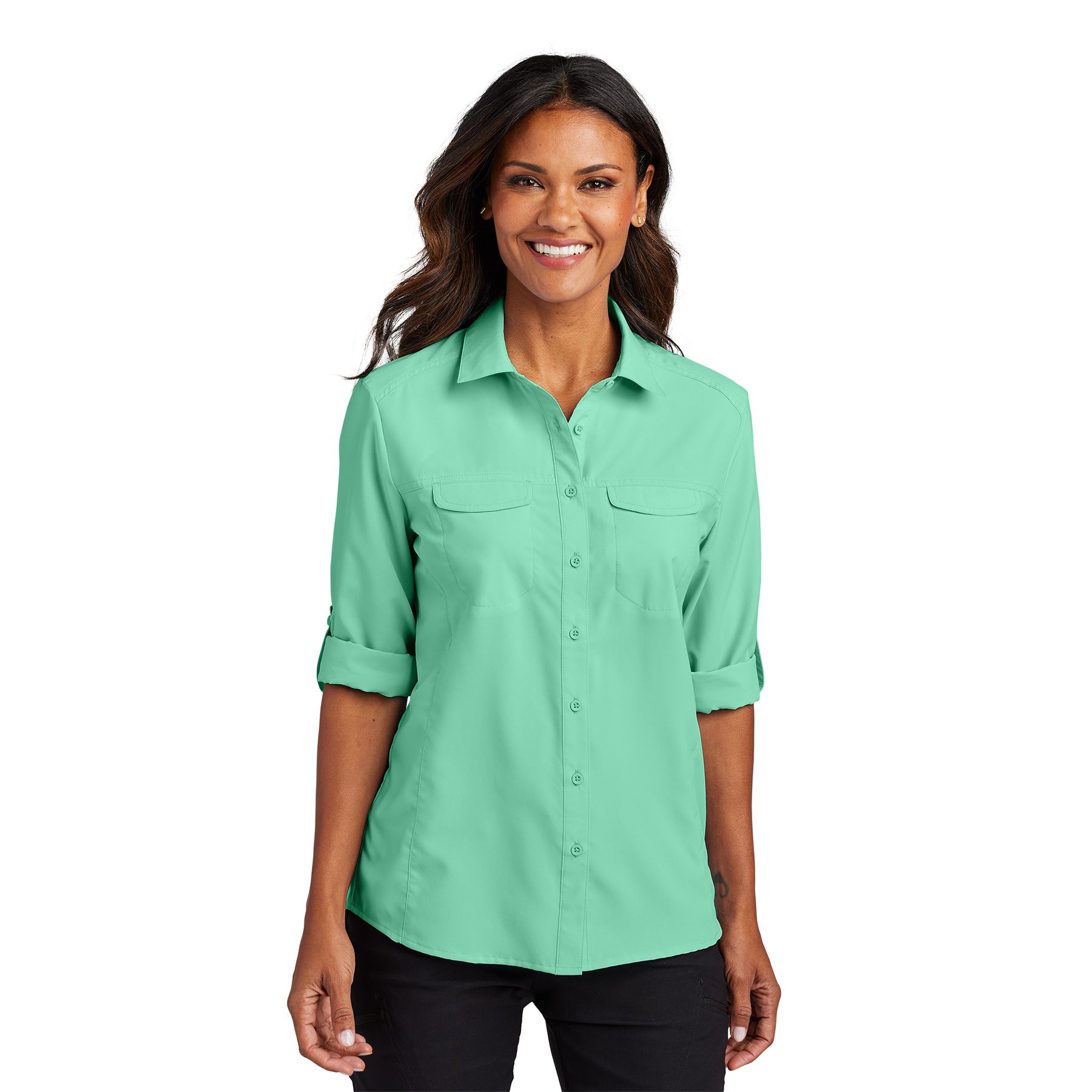 Bright Seafoam women’s lightweight long sleeve performance shirt with button front, chest pockets, roll-tab sleeves, and vented mesh back panel.