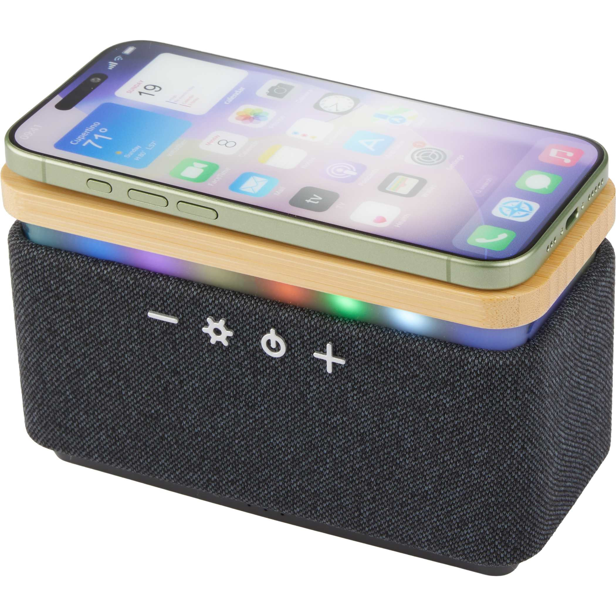 Natural/Gray Boost Fabric & FSC® Bamboo Speaker with Wireless Charging Pad featuring a natural bamboo top, gray RPET fabric wrap, built-in wireless charging surface, multi-color light accents, and compact speaker design for wireless audio playback and device charging.