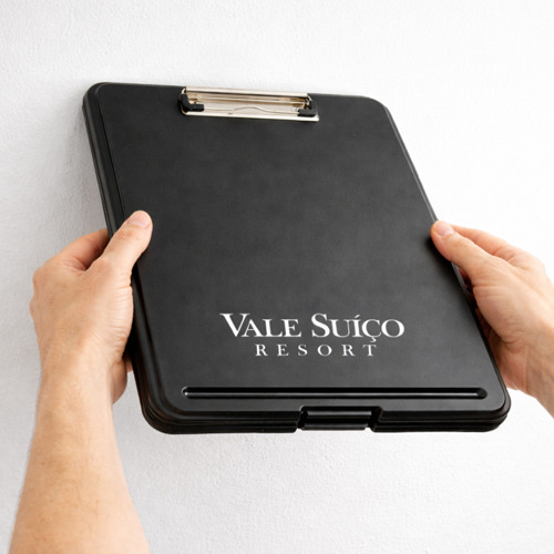 Black ABS plastic storage clipboard with silver and black clip featuring an interior storage compartment for documents and office supplies.