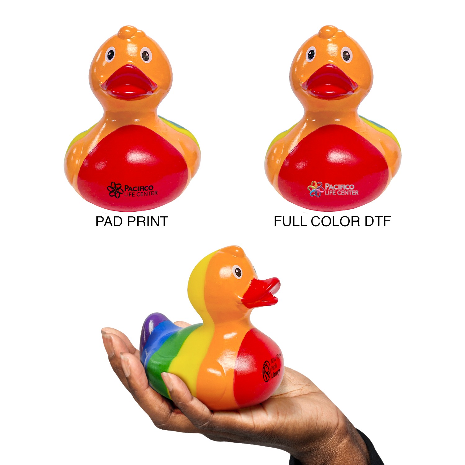 Rainbow Duck promotional rubber bath toy featuring a classic duck shape with a vibrant rainbow multicolor finish, made from smooth molded vinyl/plastic material, designed for bath time play, novelty collections, and branded promotional giveaways.