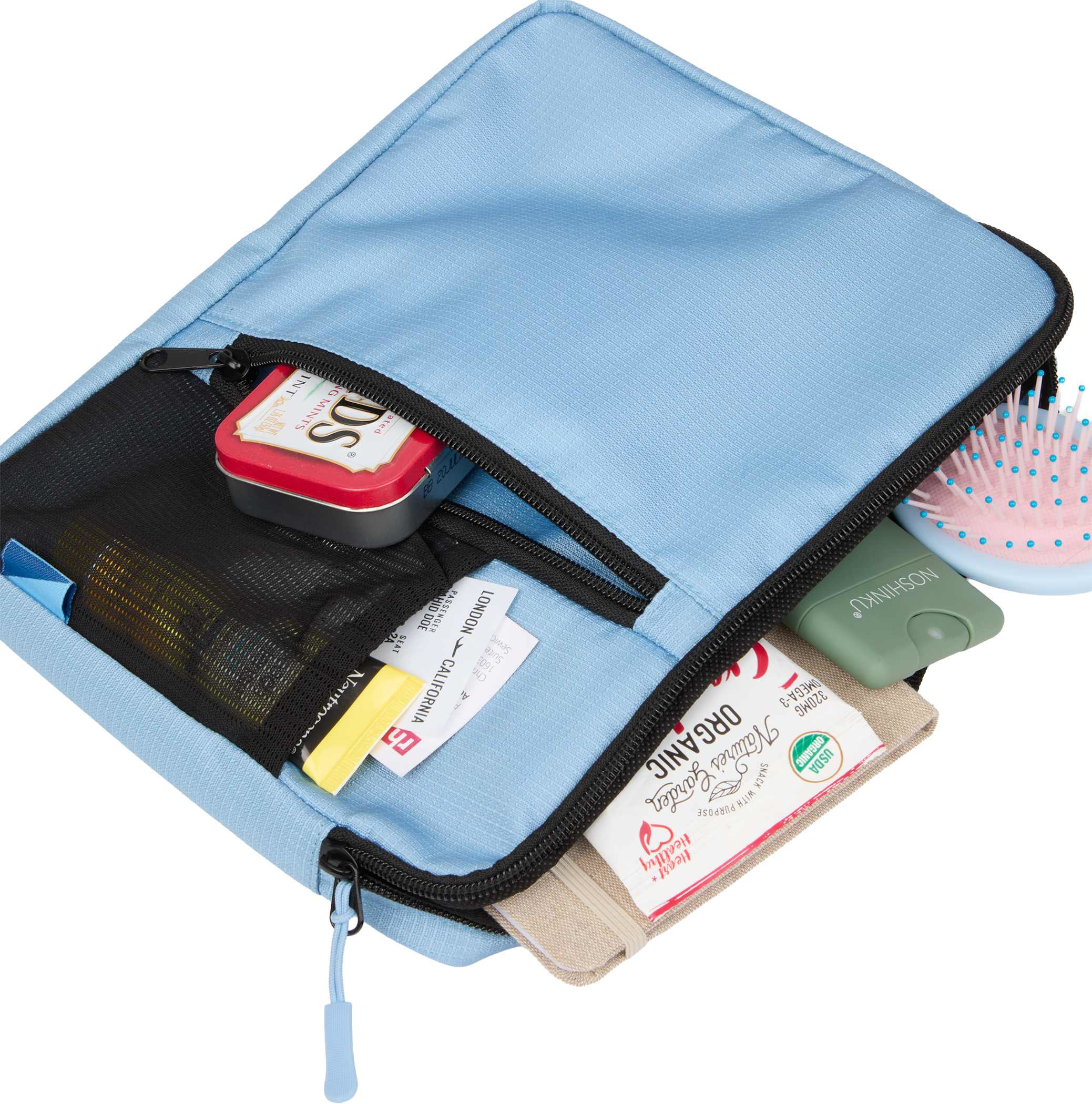 Blue Wander & Roam Organizer Case RPET ripstop 600D fabric, shown in a styled lifestyle setting as a compact travel organizer pouch with a top grab handle and front zip pocket, designed for storing chargers, cables, and small electronics in a neatly structured, portable case.