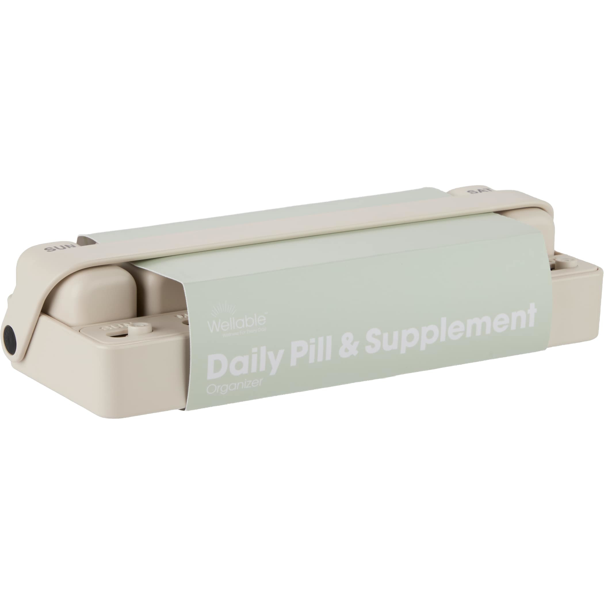 Cream Wellable™ Daily Pill and Supplement Organizer with seven removable sliding compartments, built-in daily reminder tracks, and compact rectangular design for organizing vitamins, supplements, or medications at home or while traveling.