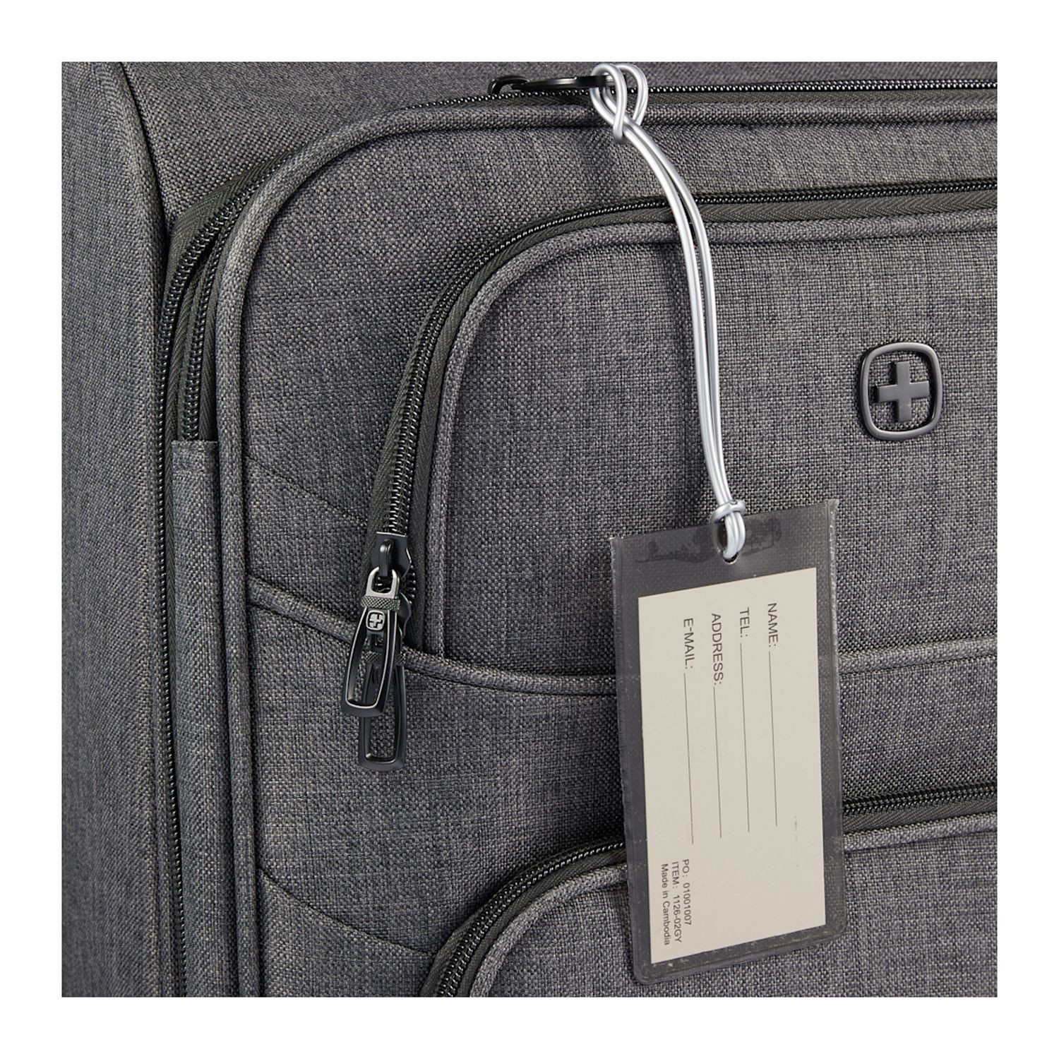 Gray transparent PVC luggage tag with self-loop strap and visible ID card insert for easy travel bag identification.