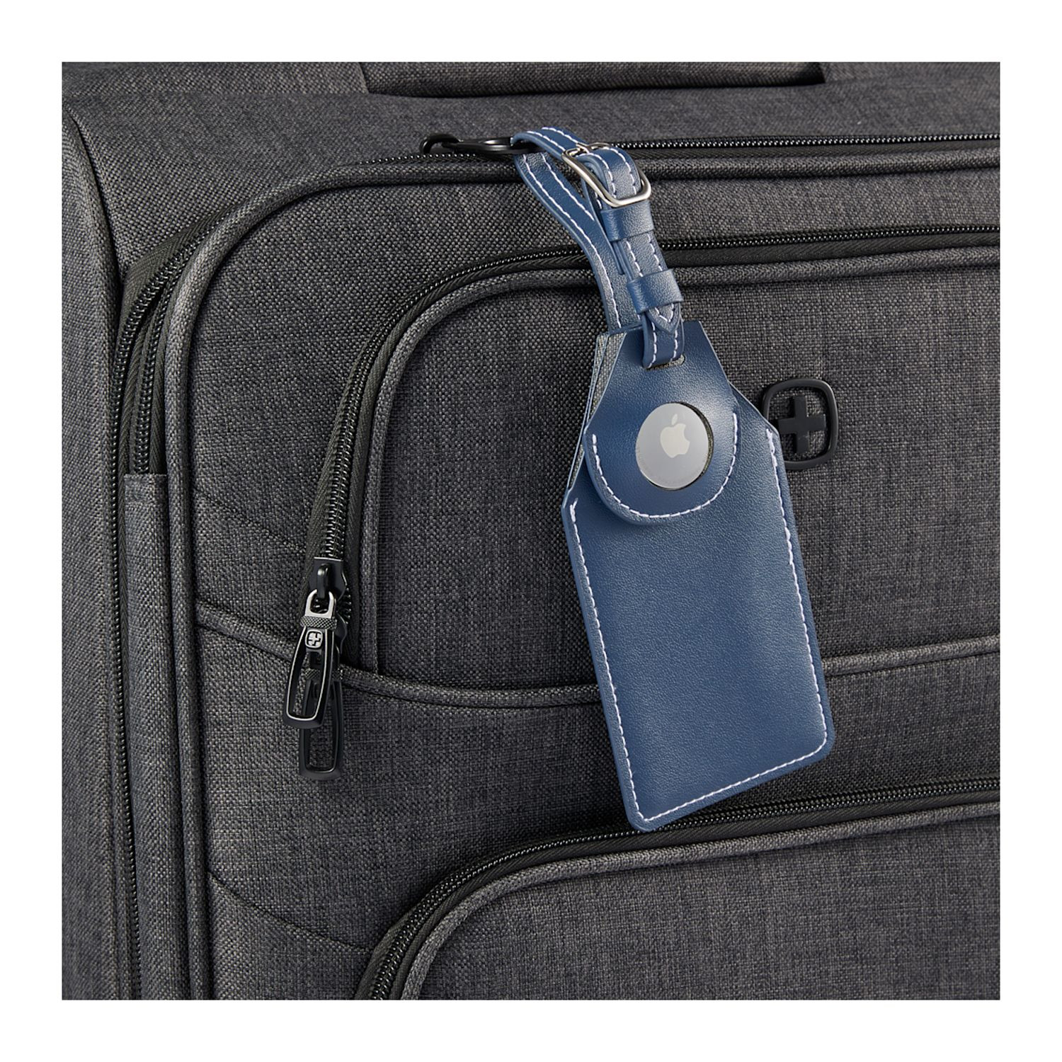 Navy recycled PU luggage tag with built-in AirTag holder, clear ID window, and secure hook-and-loop closure for travel identification.