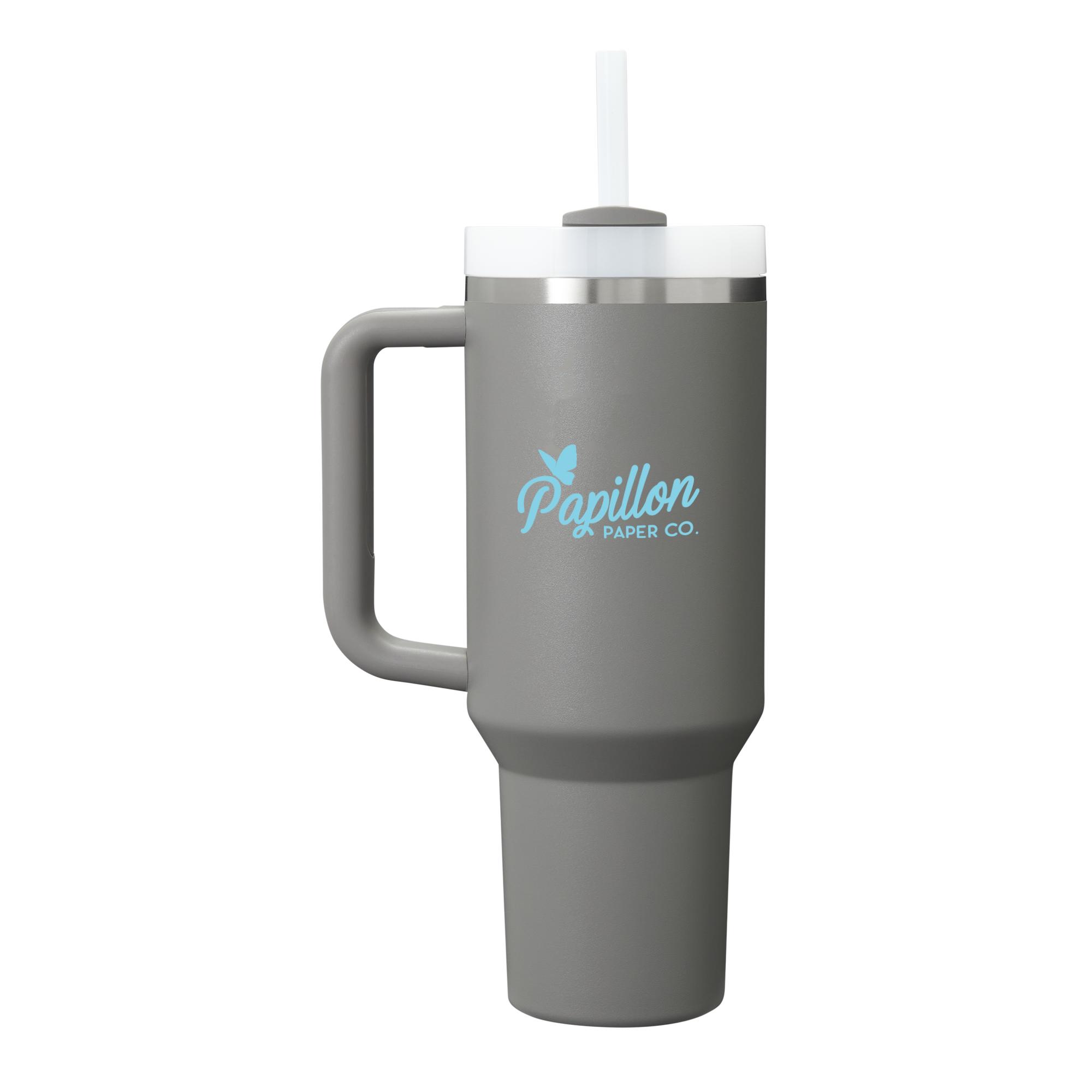 Stone 40 oz insulated tumbler with a soft light gray finish, ergonomic handle, tapered base, reusable straw, and double-wall vacuum insulation designed for all-day hydration.