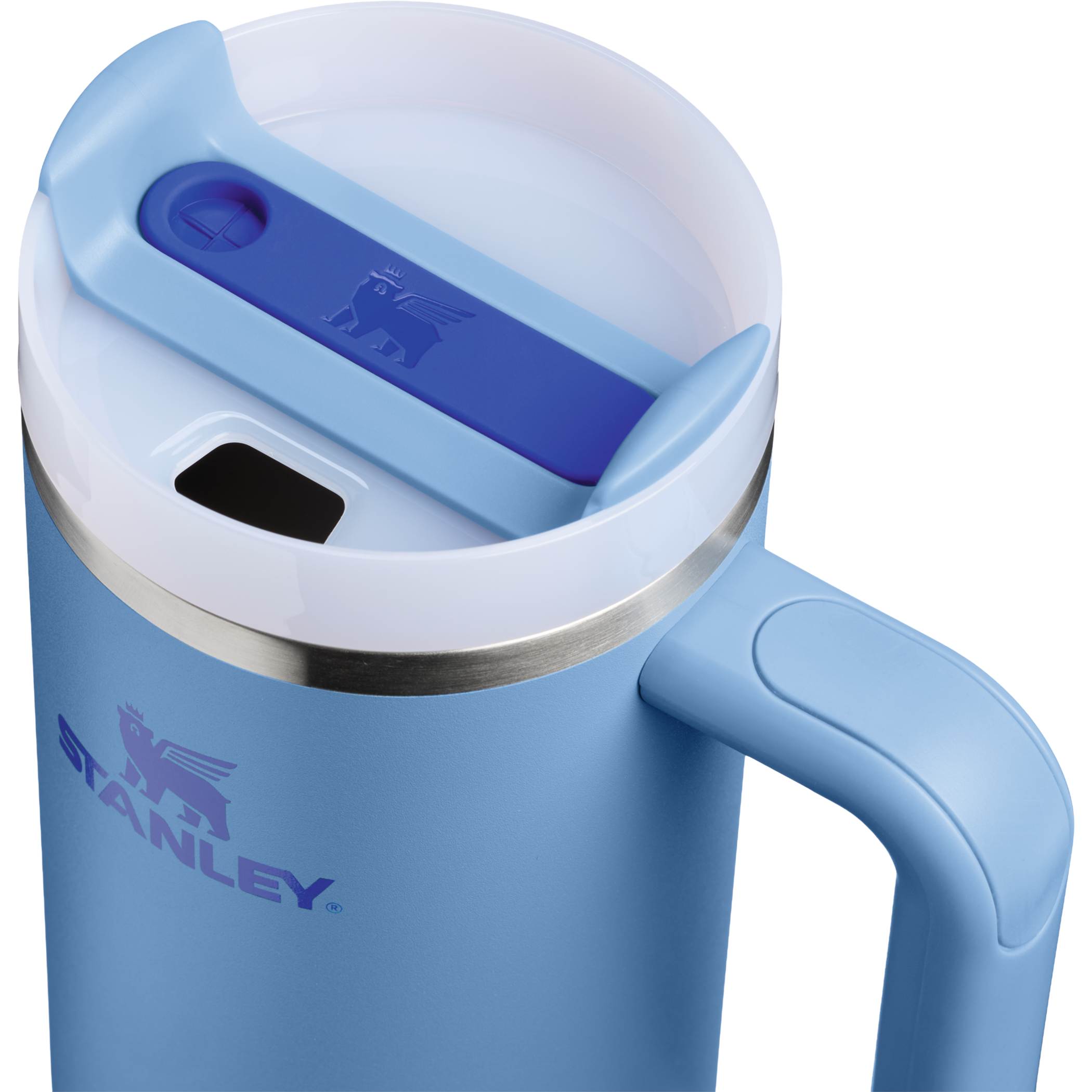 Sky Blue 30 oz insulated tumbler with a soft off-white finish, ergonomic handle, tapered base, reusable straw, and double-wall vacuum insulation for all-day hydration.