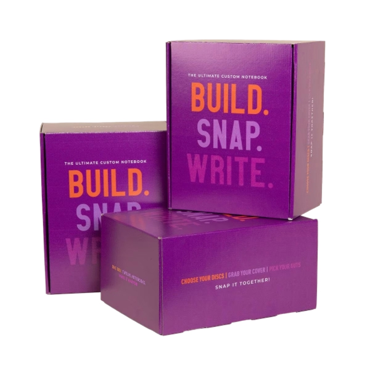 Interactive notebook kit with customizable covers, pages, and binding discs, packaged in a branded box for hands-on assembly