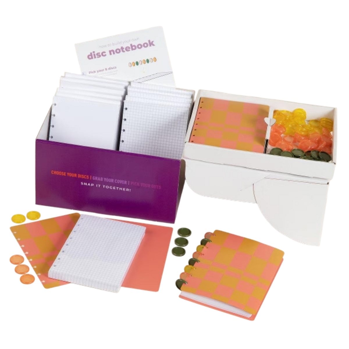 Interactive notebook kit with customizable covers, pages, and binding discs, packaged in a branded box for hands-on assembly