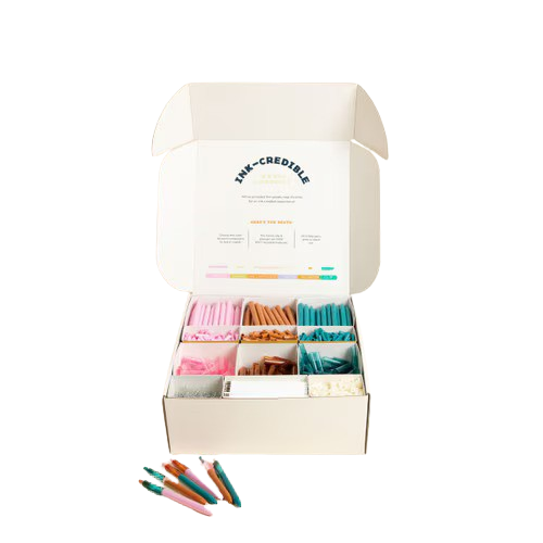 Pen display bar featuring assorted colorful pens arranged for easy selection, designed for promotional events, trade shows, and interactive branding experiences.