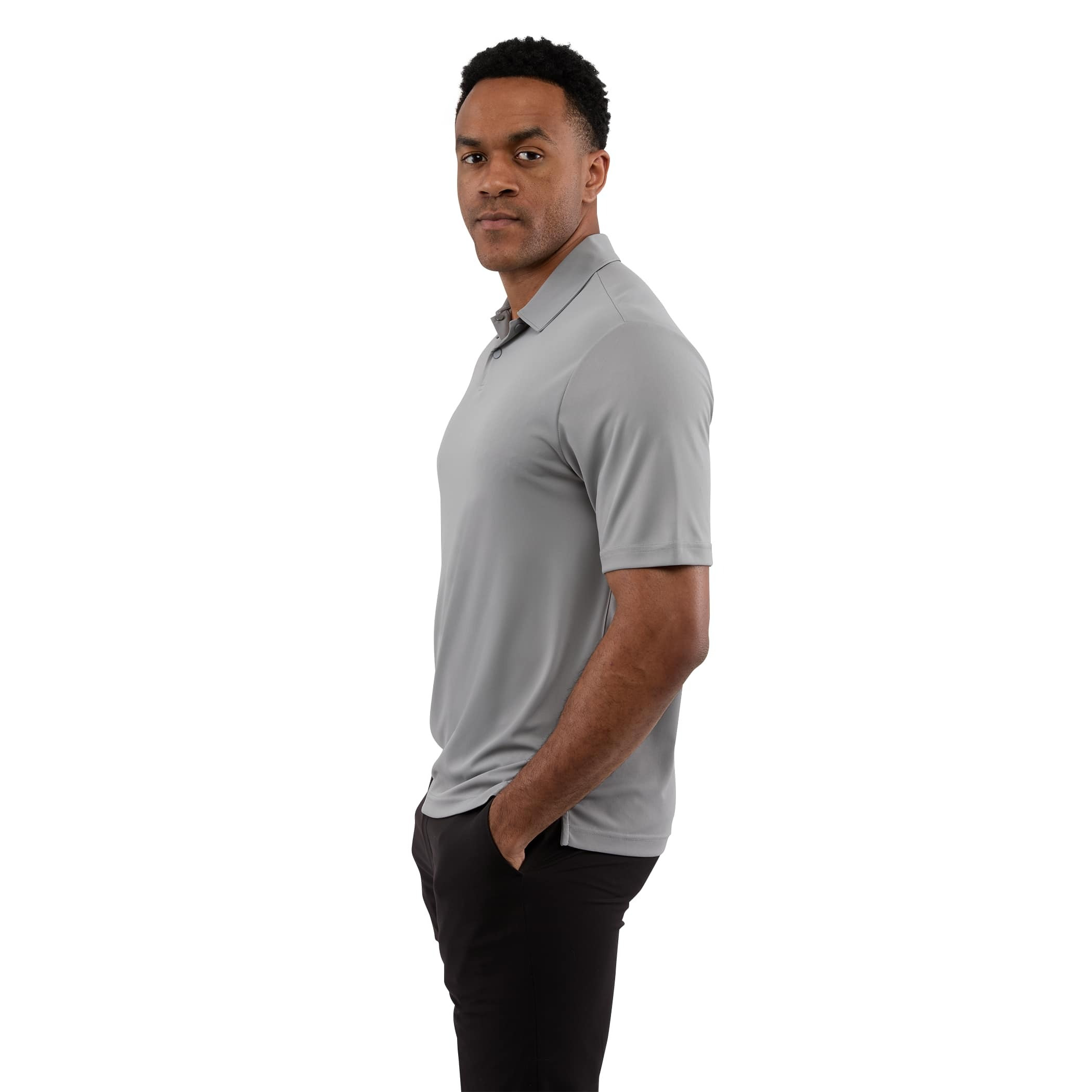 A man wearing a Quarry Men’s Dara Recycled Tech Polo made from structured recycled polyester fabric during an outdoor event. The short-sleeve polo features a modern two-snap button placket, clean snag-resistant texture, and an athletic fit, showcasing its use as professional corporate apparel.