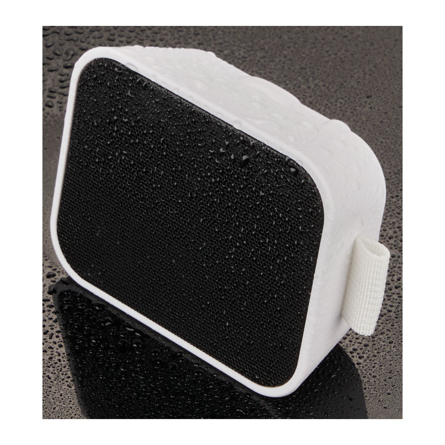 White water-resistant Bluetooth® speaker with built-in microphone, music controls, integrated carrying loop, and compact portable design.