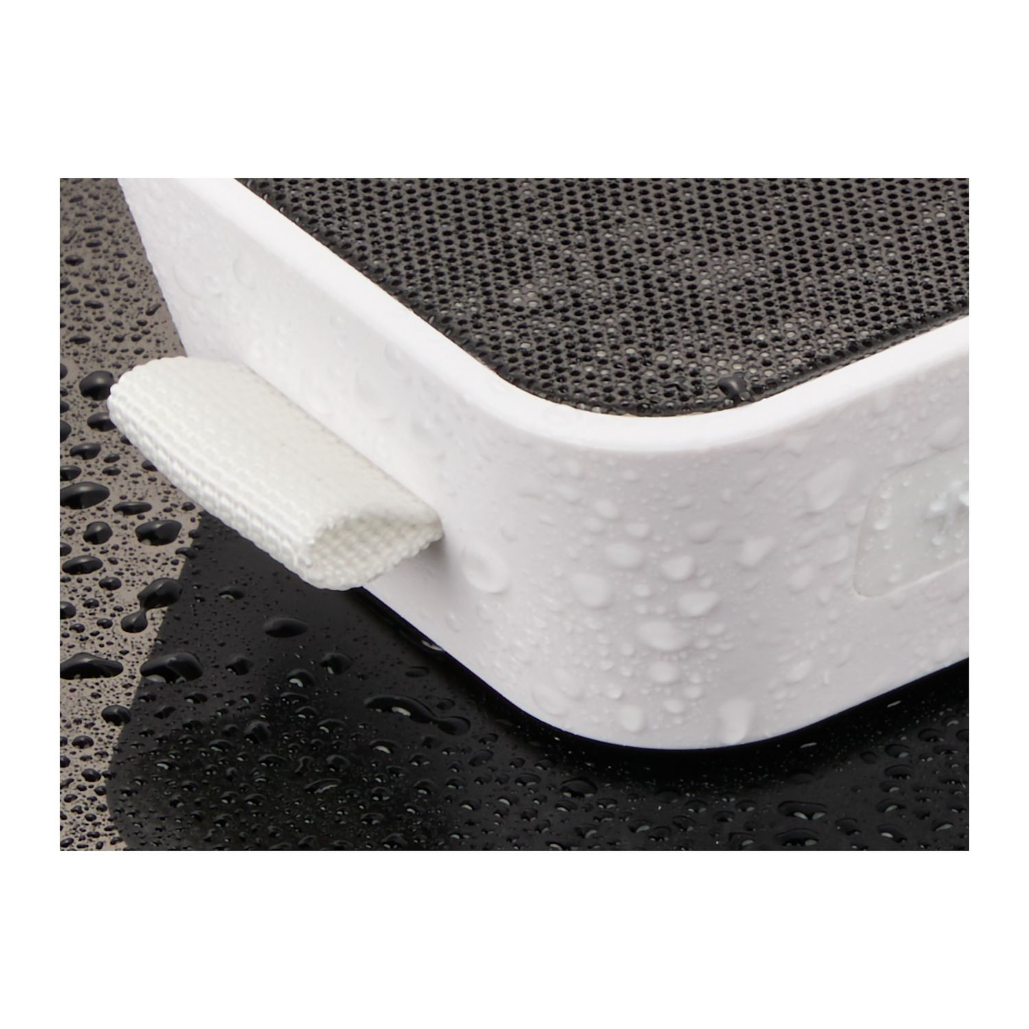 White water-resistant Bluetooth® speaker with built-in microphone, music controls, integrated carrying loop, and compact portable design.