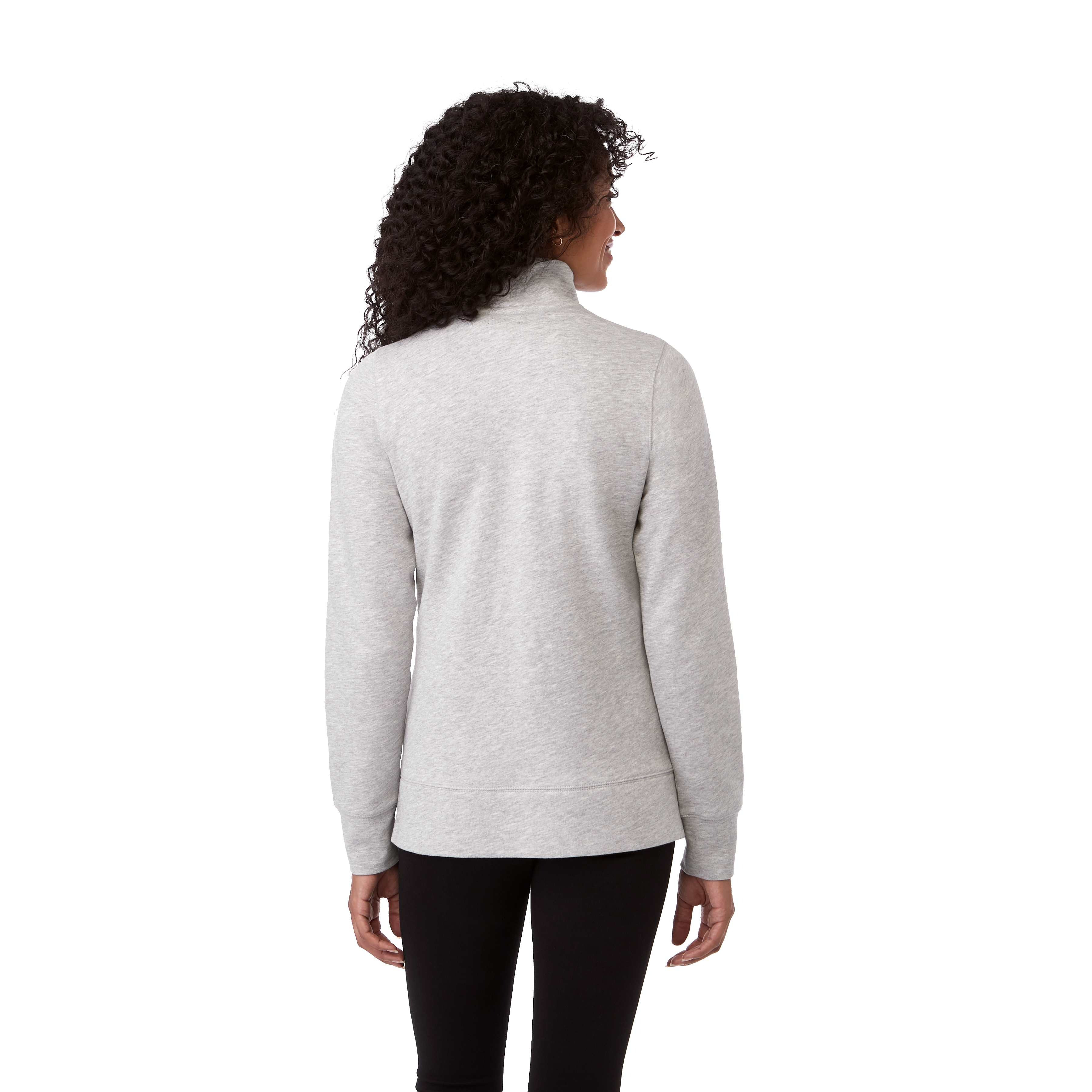 A woman wearing Heather Gray Secondary Dayton Classic Fleece Half Zip Pullover featuring a soft cotton-polyester fleece fabric, stand collar with half-zip front, long sleeves, and rib-knit cuffs and hem, designed for comfortable everyday layering and casual wear.