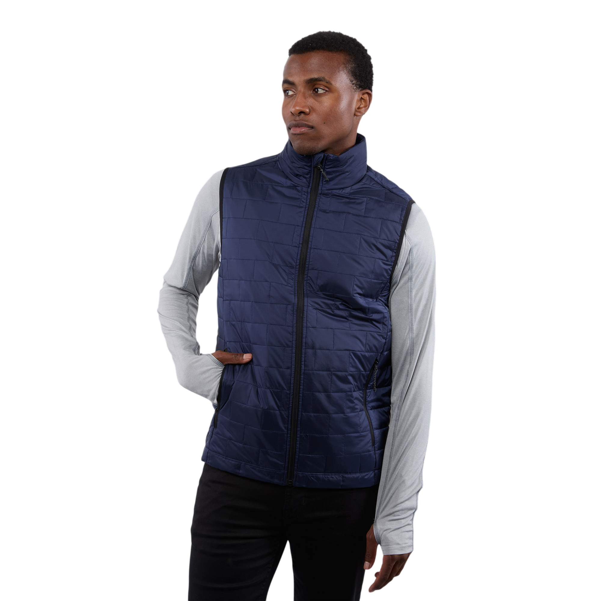 A man wearing the Men's Telluride Packable Insulated Vest in Vintage Navy, featuring a lightweight quilted nylon ripstop shell, full-zip front, stand collar, and zippered pockets, designed for comfortable layering and everyday outdoor wear.