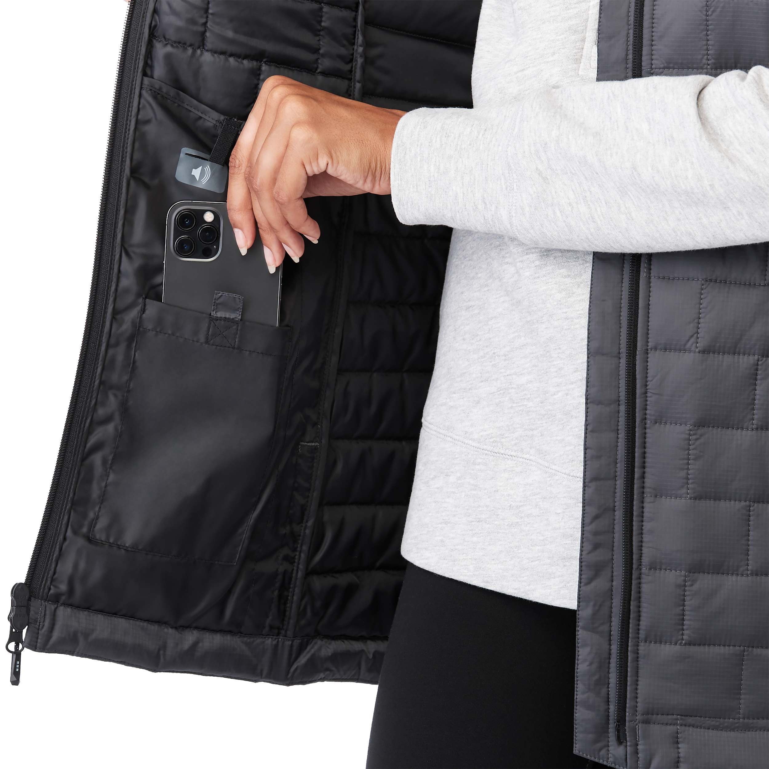 Women's Telluride Packable Insulated Vest in Gray Storm, featuring a lightweight quilted nylon ripstop shell, full-zip front, stand collar, and zippered pockets, designed for comfortable layering and everyday outdoor wear.