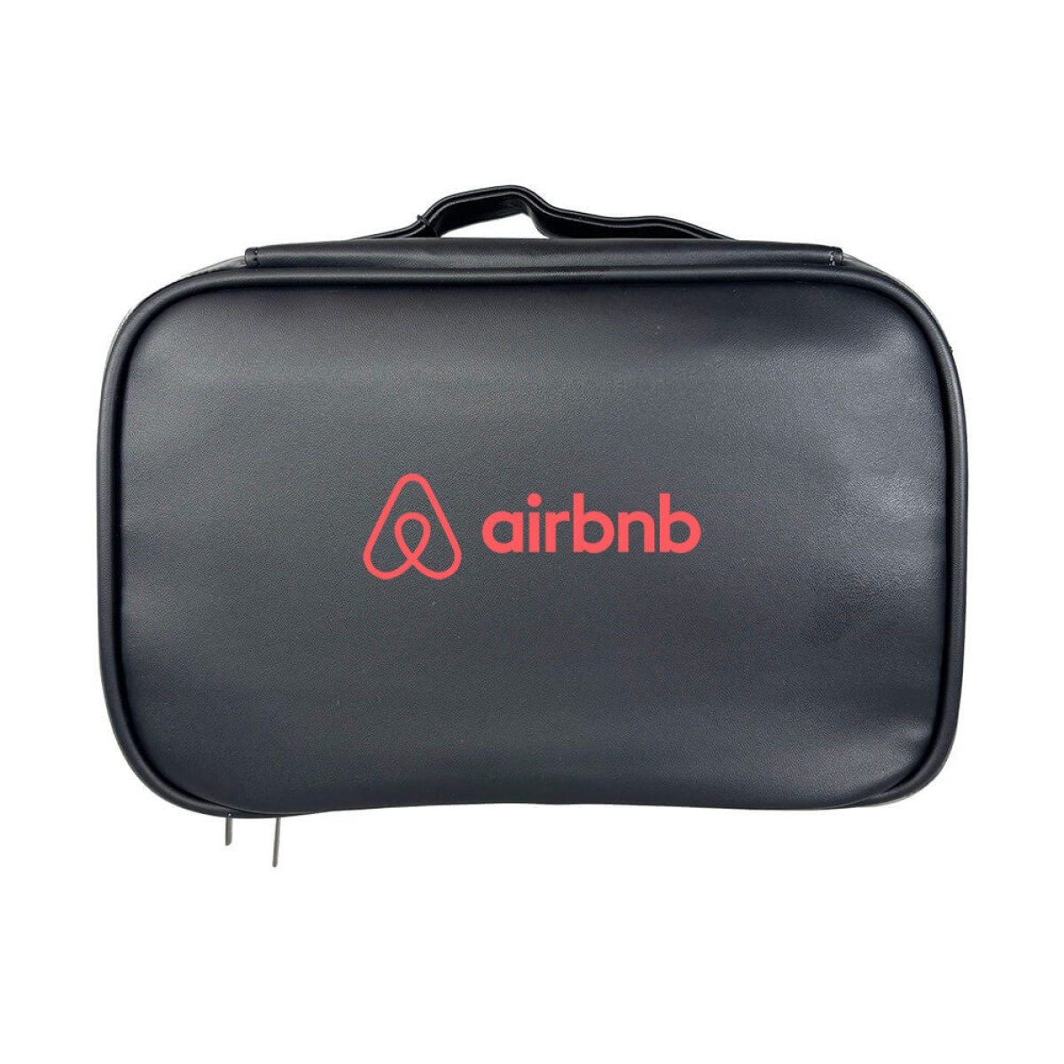 Brookstone 3 Piece Toiletry Kit featuring a sleek black vegan leather travel organizer set, including a main zippered pouch with transparent TPU side panels and two additional matching accessory pouches, designed for neatly storing toiletries and travel essentials.