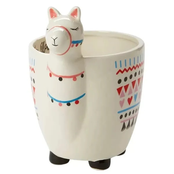 White ceramic llama-shaped mug with a sturdy handle, three-dimensional handcrafted design, and novelty drinkware styling for hot or cold beverages.