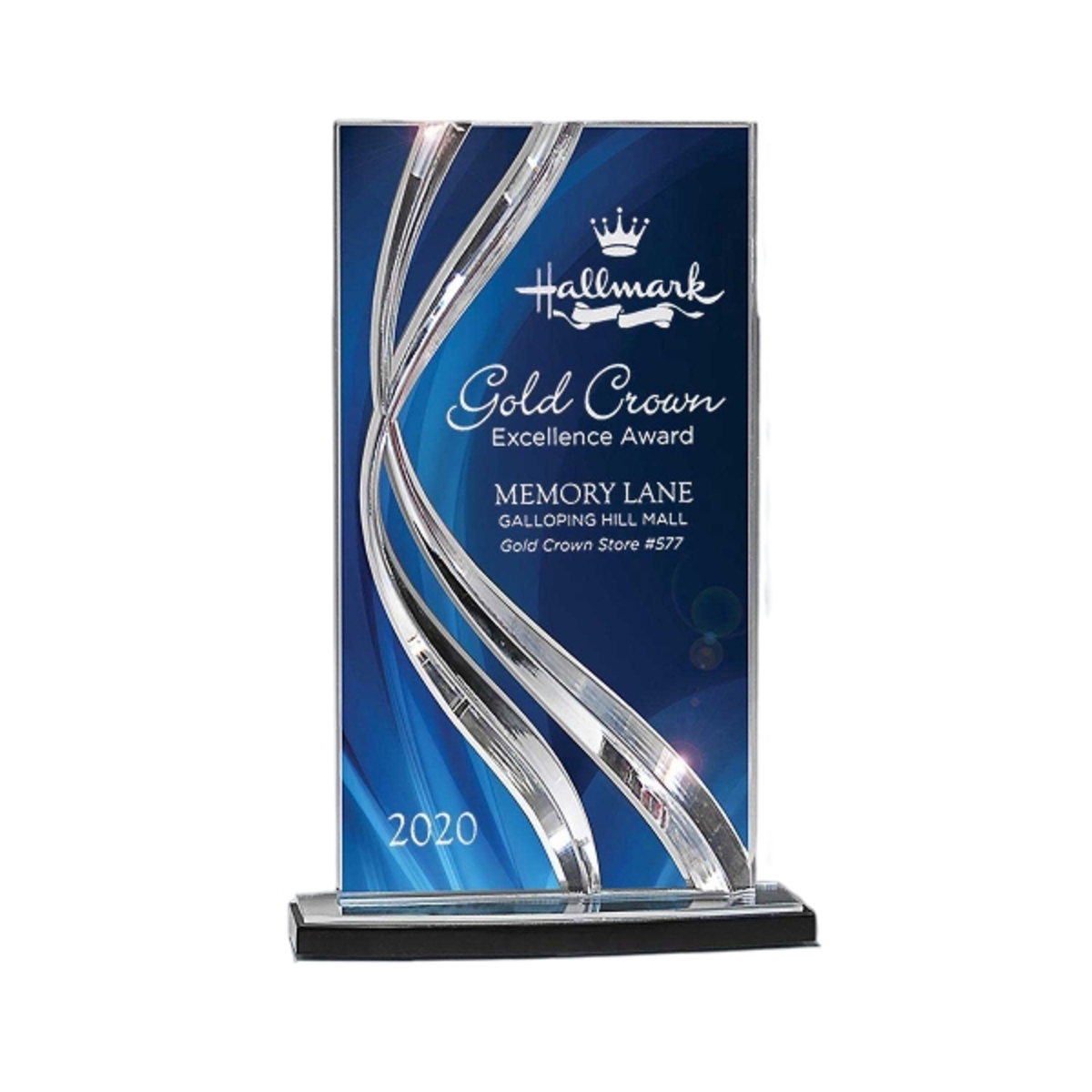 Large sweeping ribbon award with a flowing curved glass design and engraved personalization.