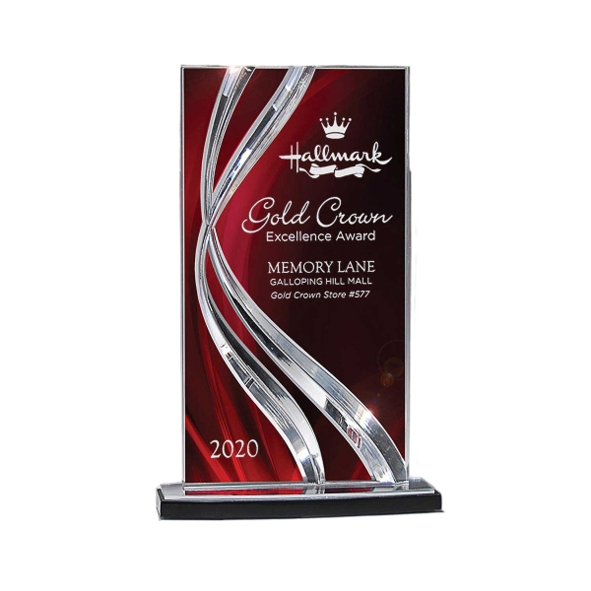Large ribbon award with a smooth curved glass design and engraved personalization.