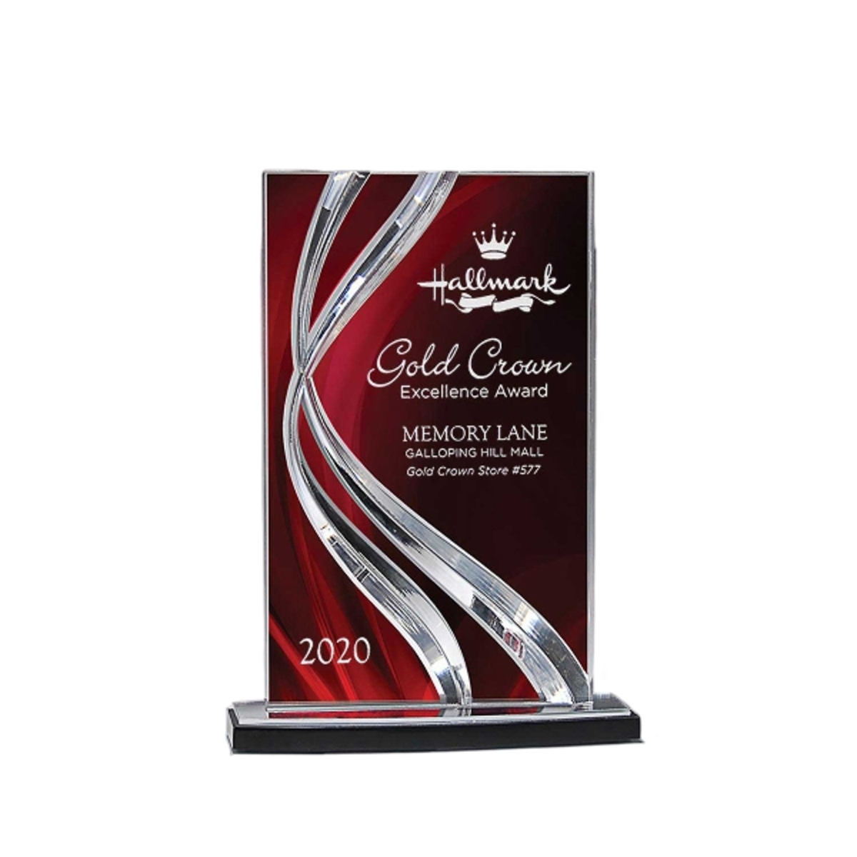 Medium ribbon award with a smooth curved glass design and engraved personalization.
