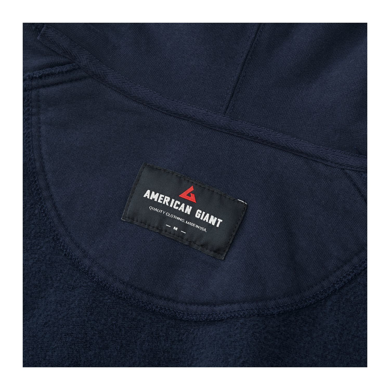 Polo blue heavyweight men’s fleece pullover hoodie with double-lined hood, ribbed side panels, and reinforced elbow patches designed for warmth and durability in cold-weather casual wear.