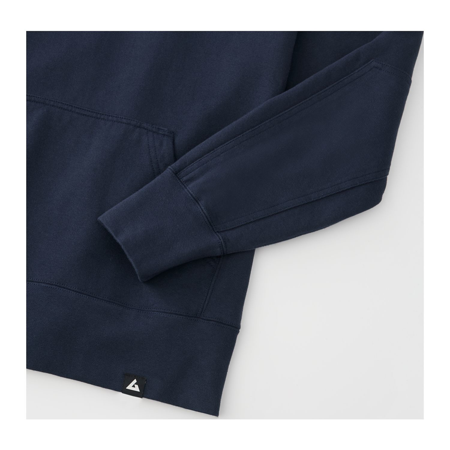 Polo blue heavyweight men’s fleece pullover hoodie with double-lined hood, ribbed side panels, and reinforced elbow patches designed for warmth and durability in cold-weather casual wear.