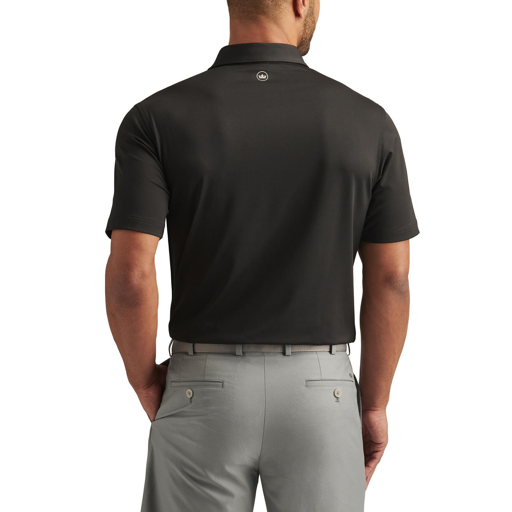 Black Peter Millar Men’s Solid Performance Polo, featuring a short-sleeve design with a self-fabric collar, three-button placket, and smooth performance fabric intended for comfortable everyday wear, golf, and business casual use.