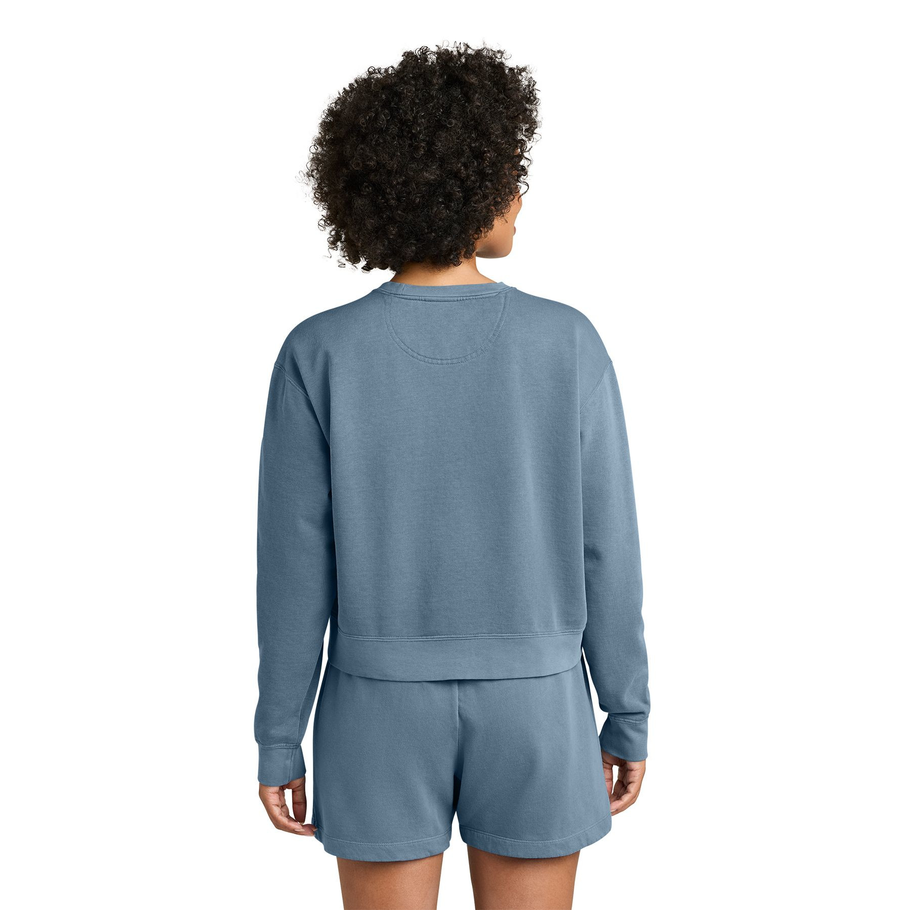 Blue Jean women's garment-dyed crewneck sweatshirt made from ring spun U.S. cotton and polyester fleece with a relaxed fit, rolled forward drop shoulders, rib knit cuffs, and waistband.