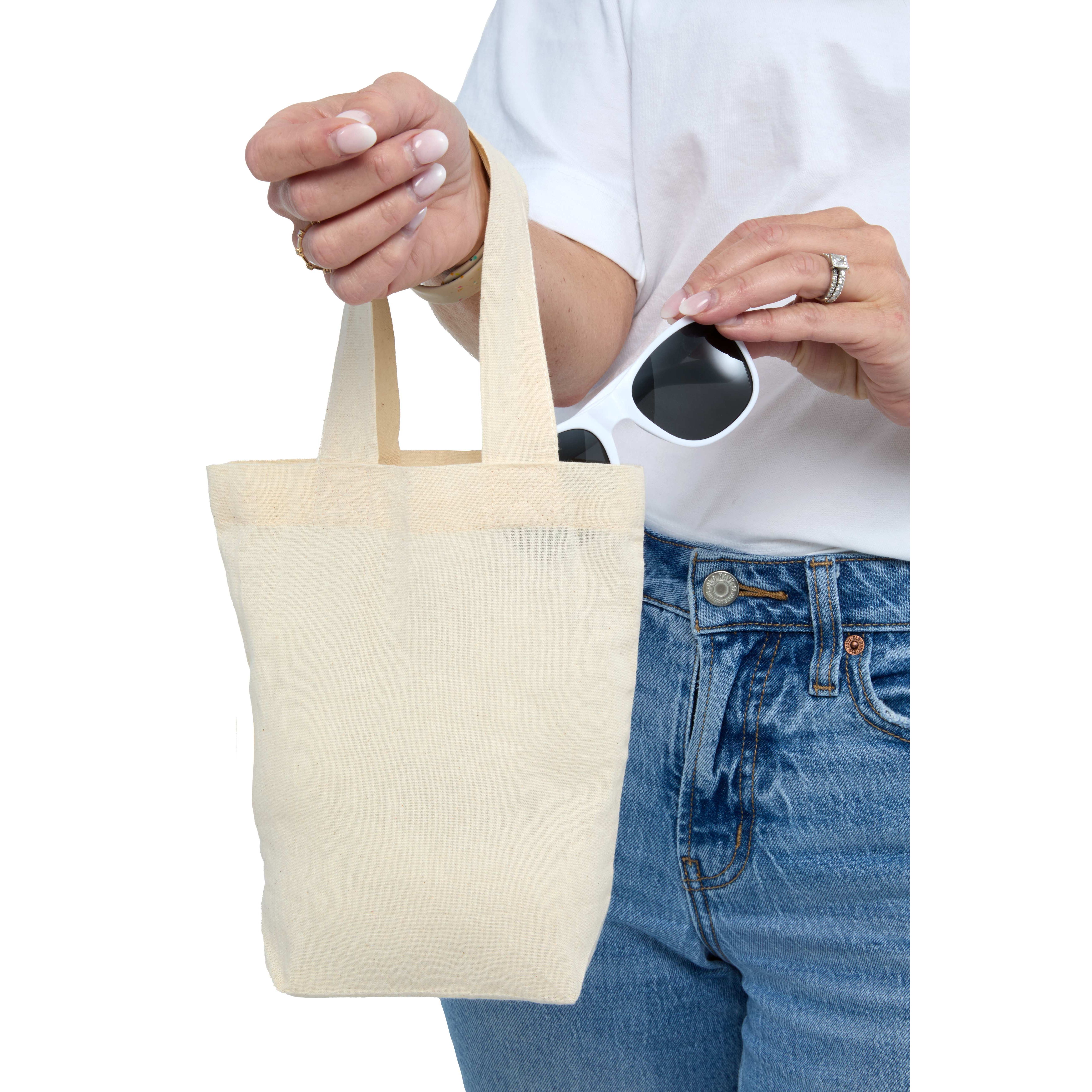 Mini 4 oz. Organic Cotton Tote, featuring lightweight natural organic cotton fabric, an open main compartment, dual carry handles, and a compact reusable design for small gifts, daily essentials, and promotional events.