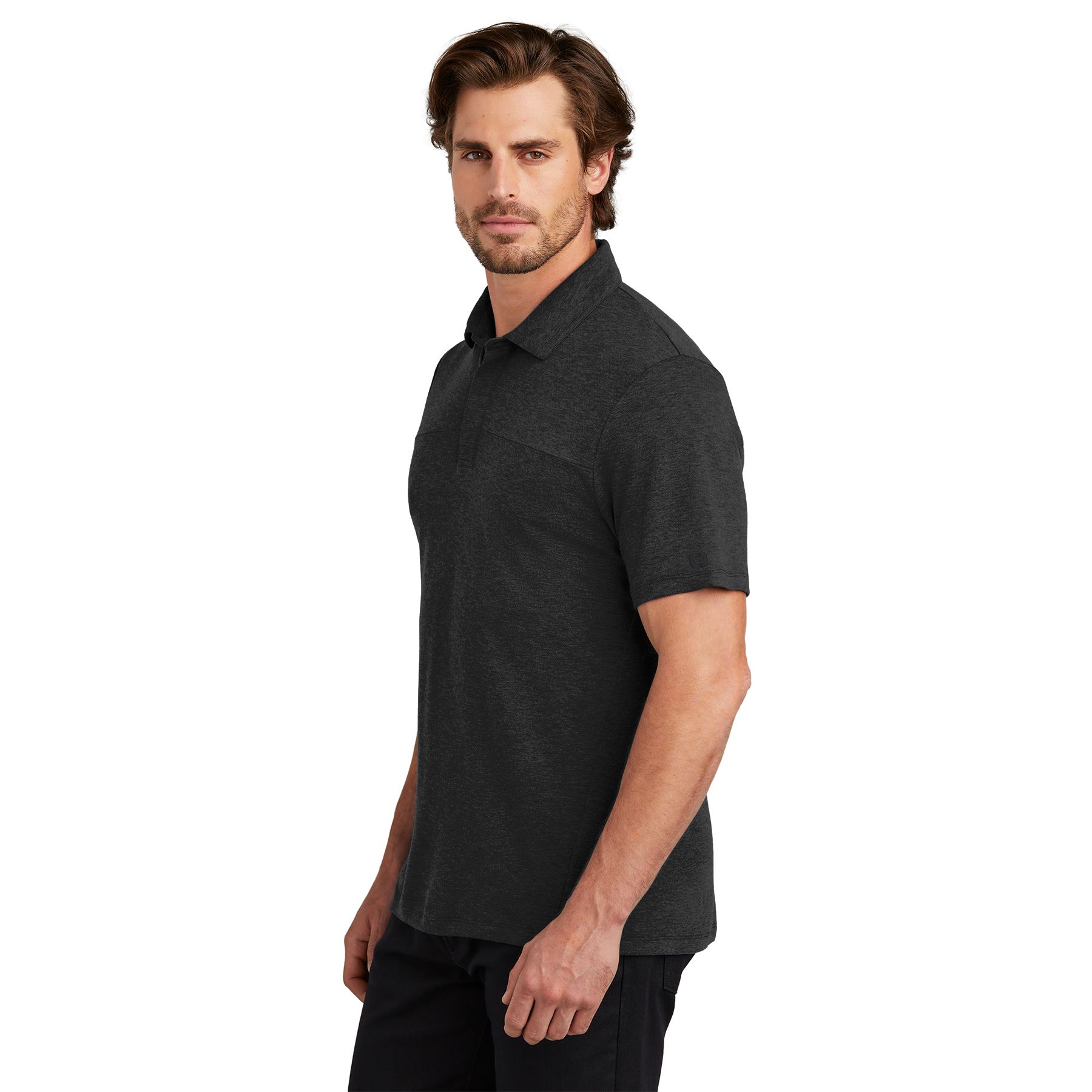 Blacktop performance polo made from a polyester and merino wool blend with a self-fabric collar, three-button placket, chest seam, forward side seams, and reflective sleeve logo.
