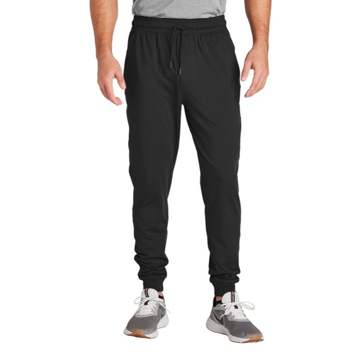 Black Sport-Tek® Sport-Wick® Stretch Jogger, featuring lightweight moisture-wicking stretch fabric, an elastic waistband with adjustable drawcord, tapered legs with elastic cuffs, and zippered side pockets for training, travel, and everyday active wear.