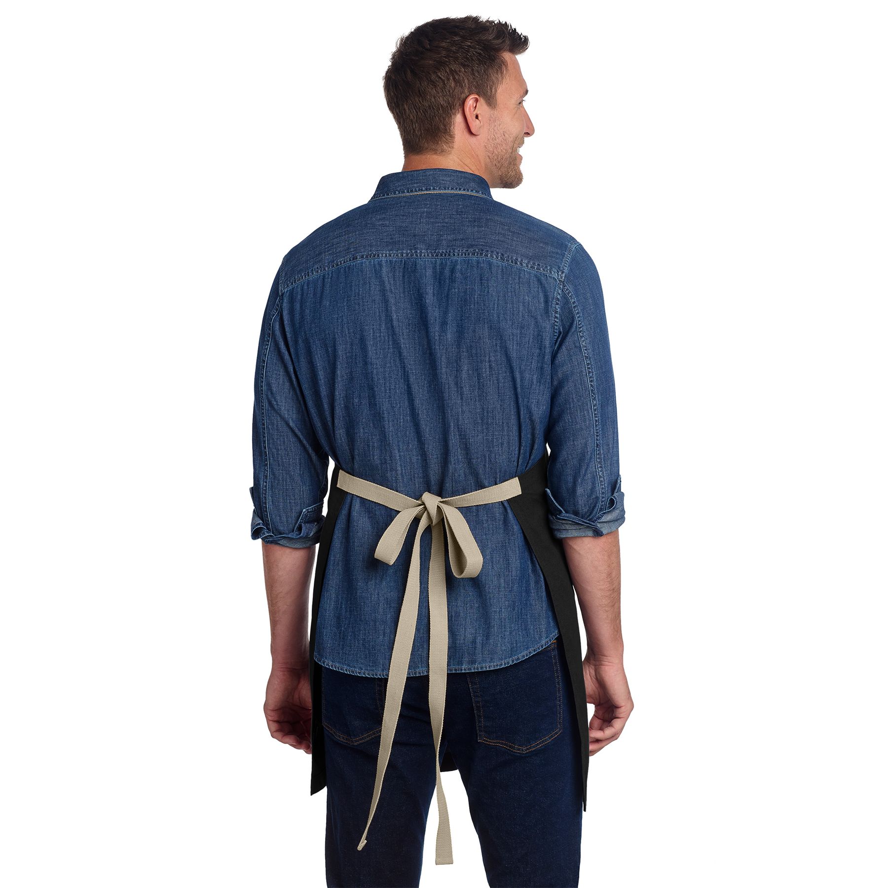 Black and stone full-length cotton canvas apron with adjustable neck strap, antique brass hardware, and two front patch pockets