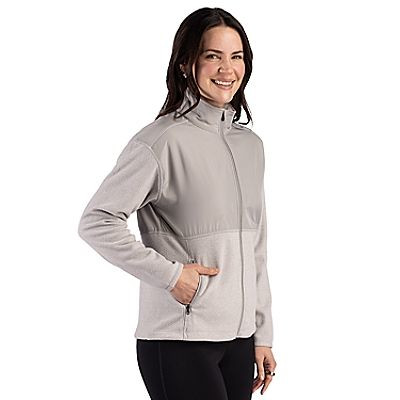 Polished women's recycled polyester full-zip fleece jacket with a mock neck, drop shoulders, zip hand pockets, and jacquard textured fabric for comfortable everyday layering.