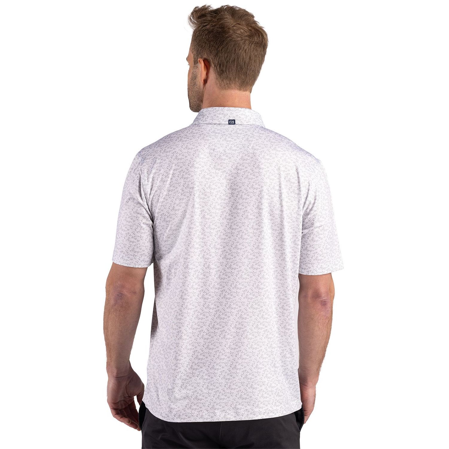Polished men's recycled fern print polo made from recycled polyester and spandex jersey with a self collar, short sleeves, moisture-wicking performance, UPF 50+ protection, and a tailored fit.