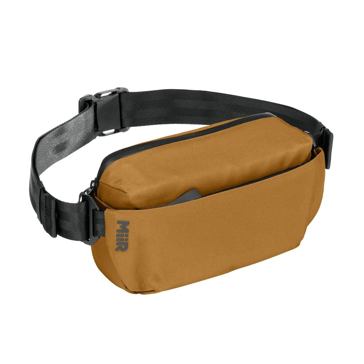 Amber Haze MiiR® Causeway Crossbody Bag with a recycled polyester exterior, adjustable shoulder strap, zippered main compartment, front zip pocket, hidden back pocket, and compact design for carrying everyday essentials while traveling or commuting.