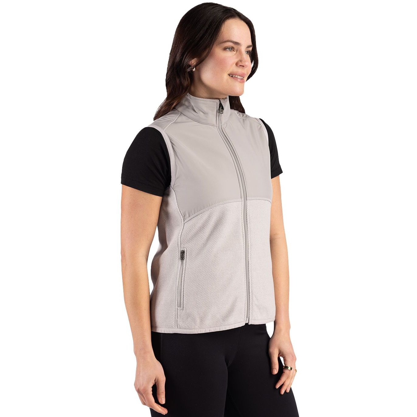 Polished Cutter & Buck women's recycled fleece full-zip vest featuring a jacquard textured finish, mock neck, and zip pockets made from recycled polyester.