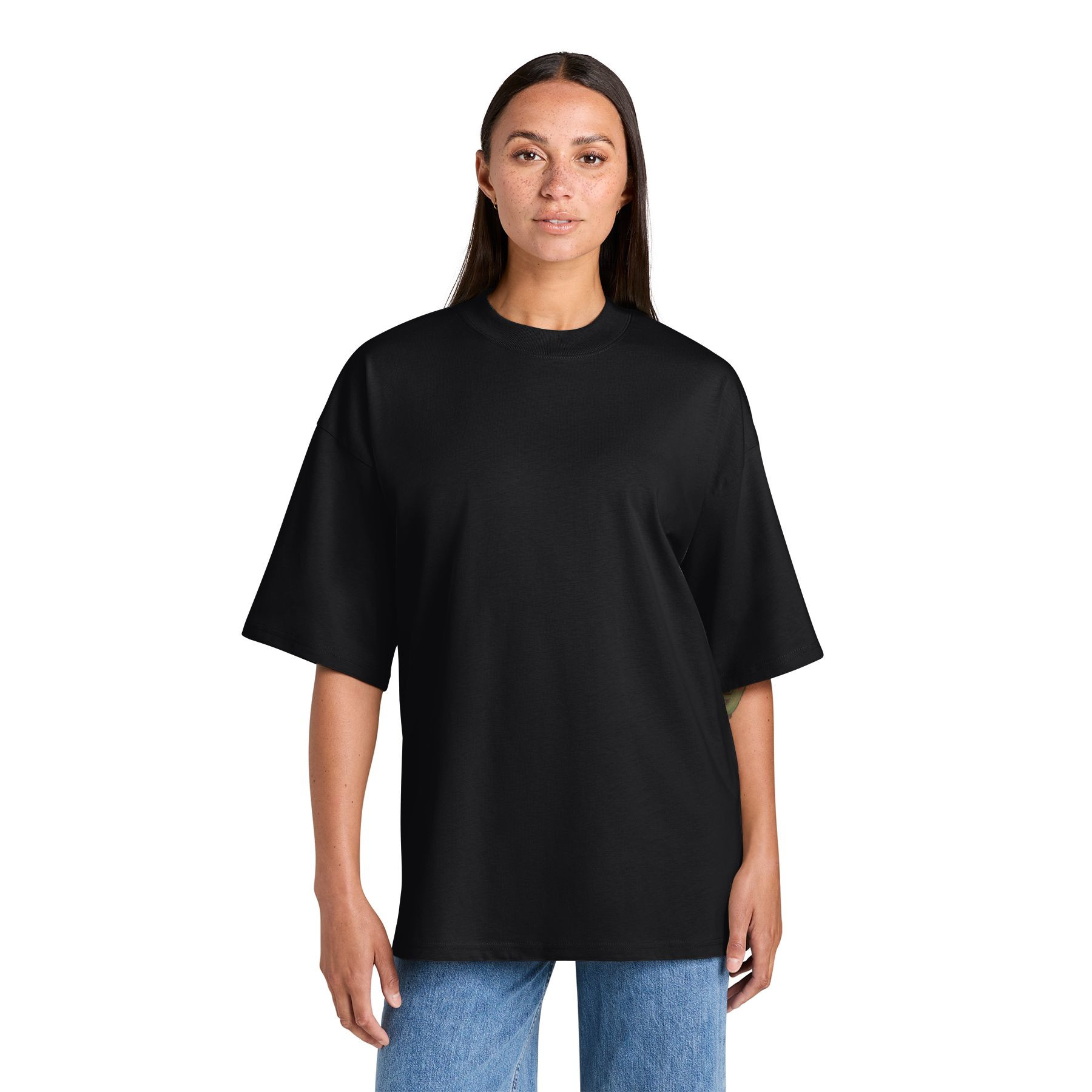 Black oversized tee made from organic combed ring spun cotton with a mock neck, dropped shoulders, side-seamed construction, and double-needle topstitched sleeves and hem.