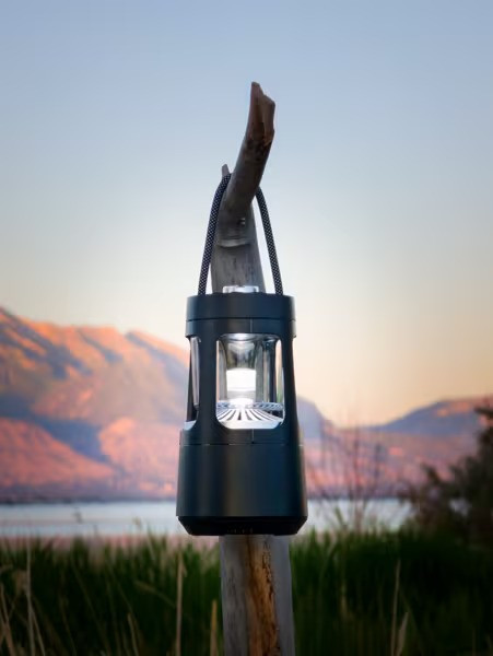 Tiki wireless speaker with LED lantern light, Bluetooth, and splashproof design.