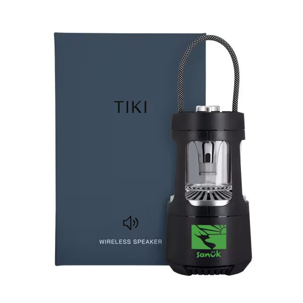 Tiki wireless speaker with LED lantern light, Bluetooth, and splashproof design.