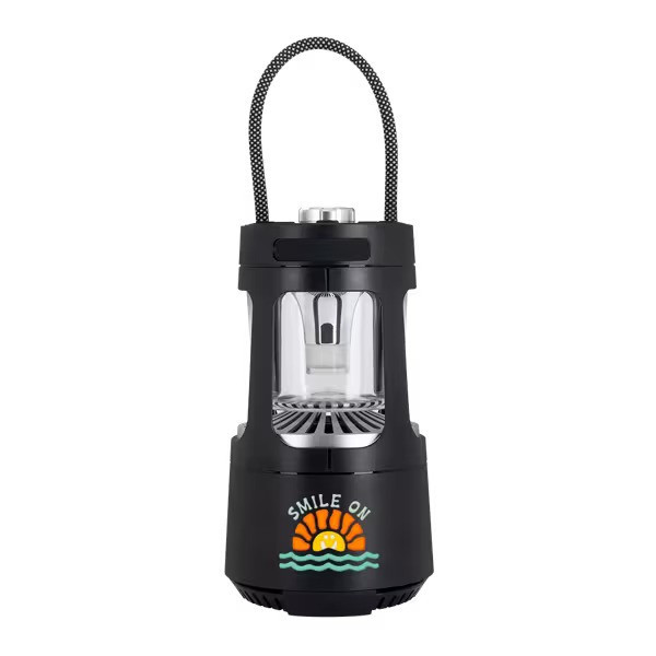 Tiki wireless speaker with LED lantern light, Bluetooth, and splashproof design.
